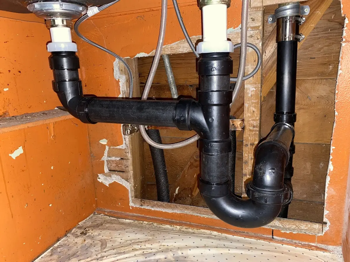 Professional Garbage Disposal Repair equipment and tools on the job in Voorhees